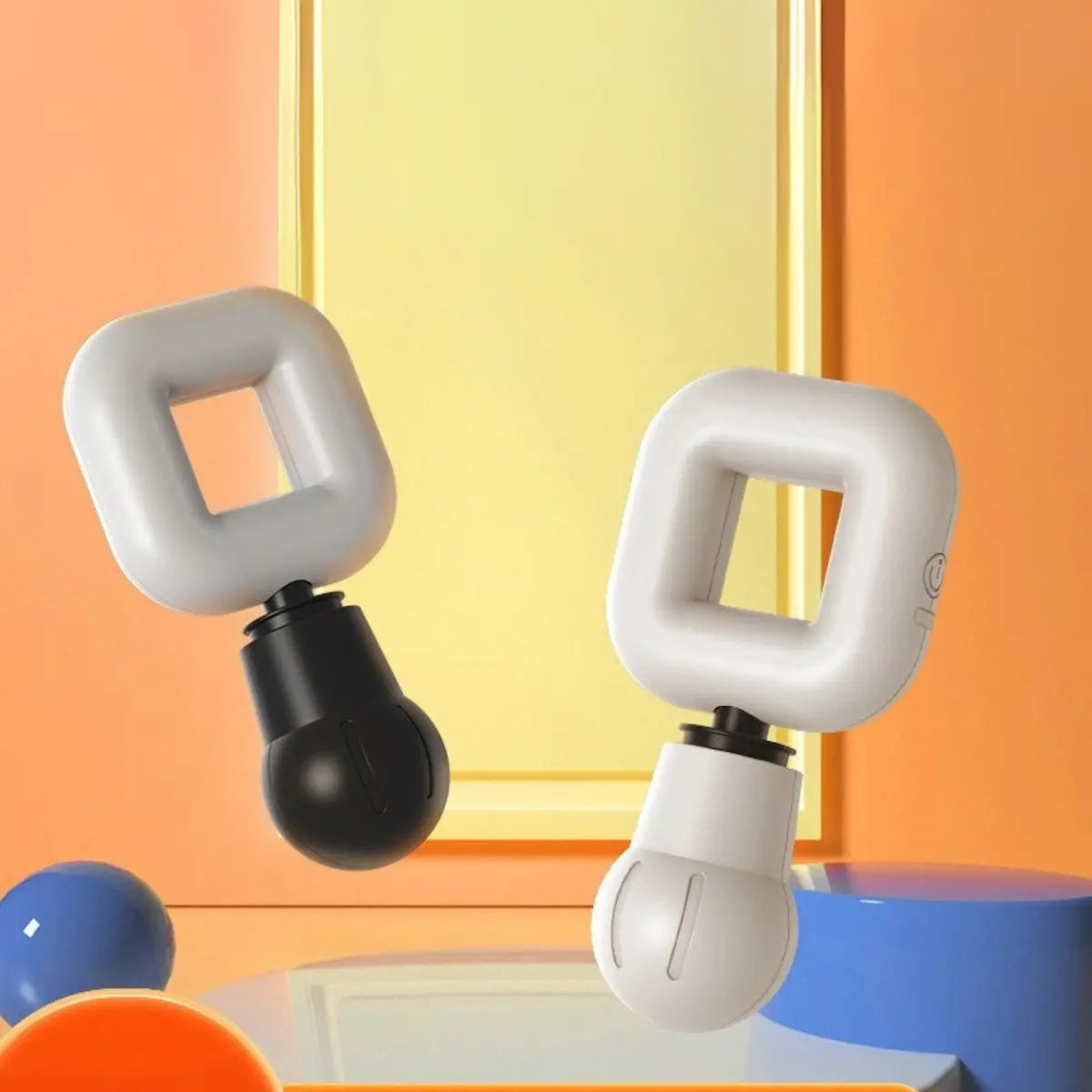 Massageador Portátil Deep Relax em versão preta e branca apoiados em superfície.