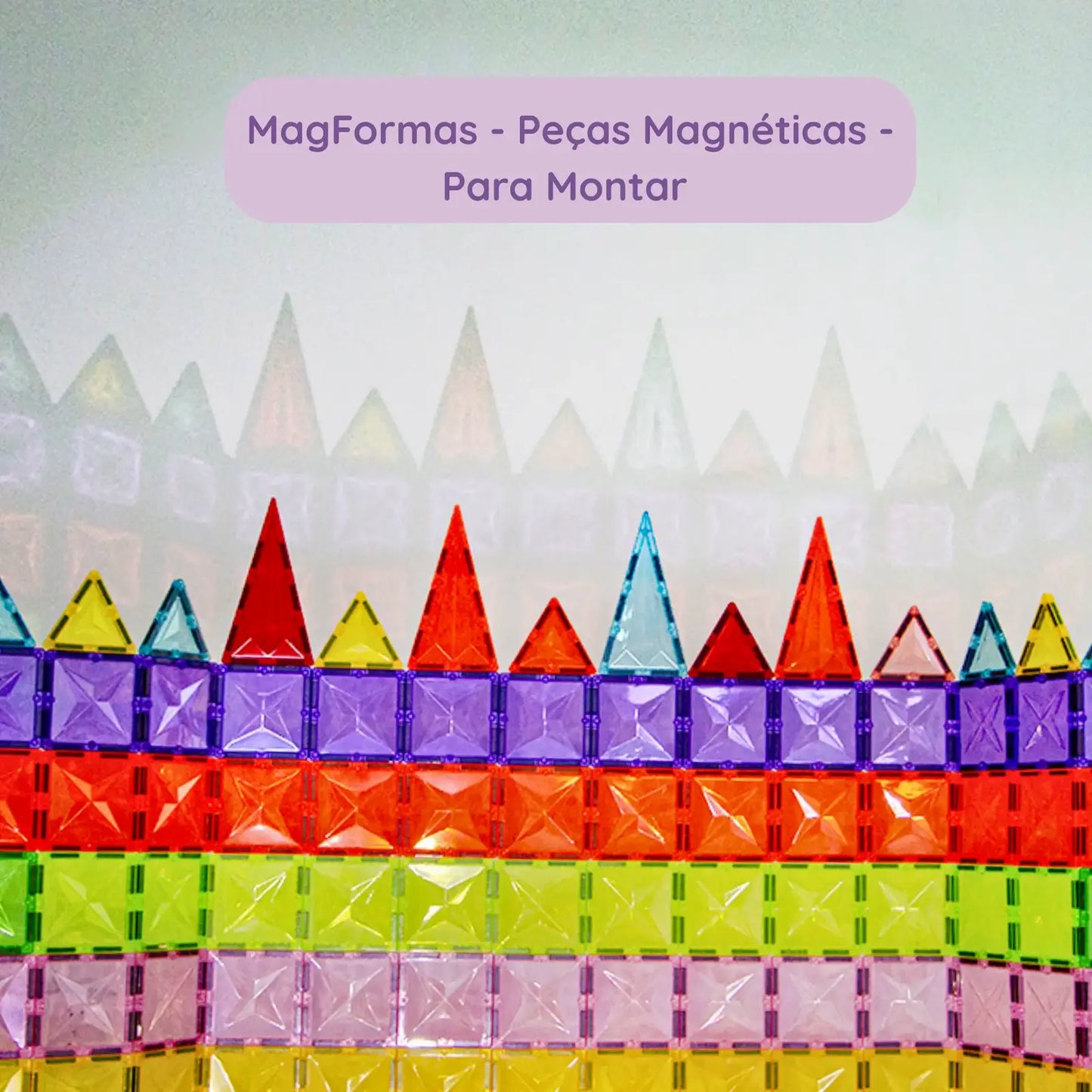 Muro criativo montado com peças magnéticas coloridas em diferentes formatos.